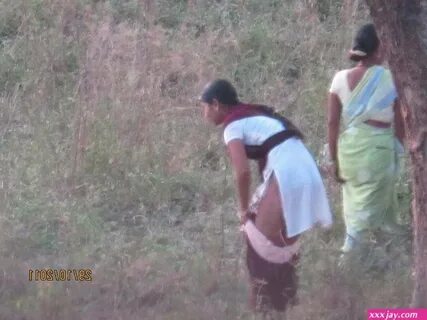 Aunty bhabhi outdoor pissing and pooping. 
