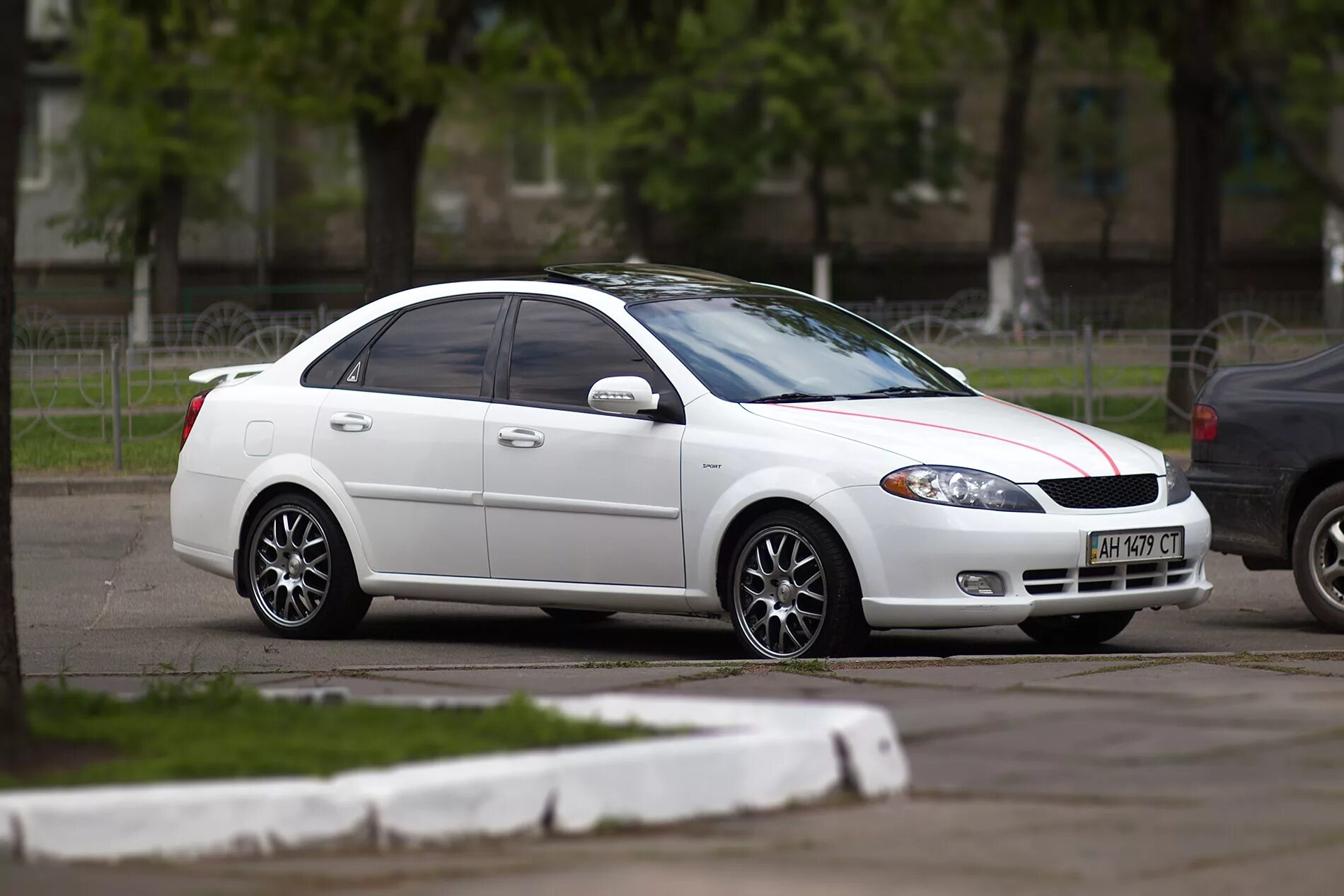 5 л 2008. Chevrolet Gentra Tuning. Gentra белый Tuning 511. Lacetti Gentra 3 Tuning. Chevrolet Gentra tuned.