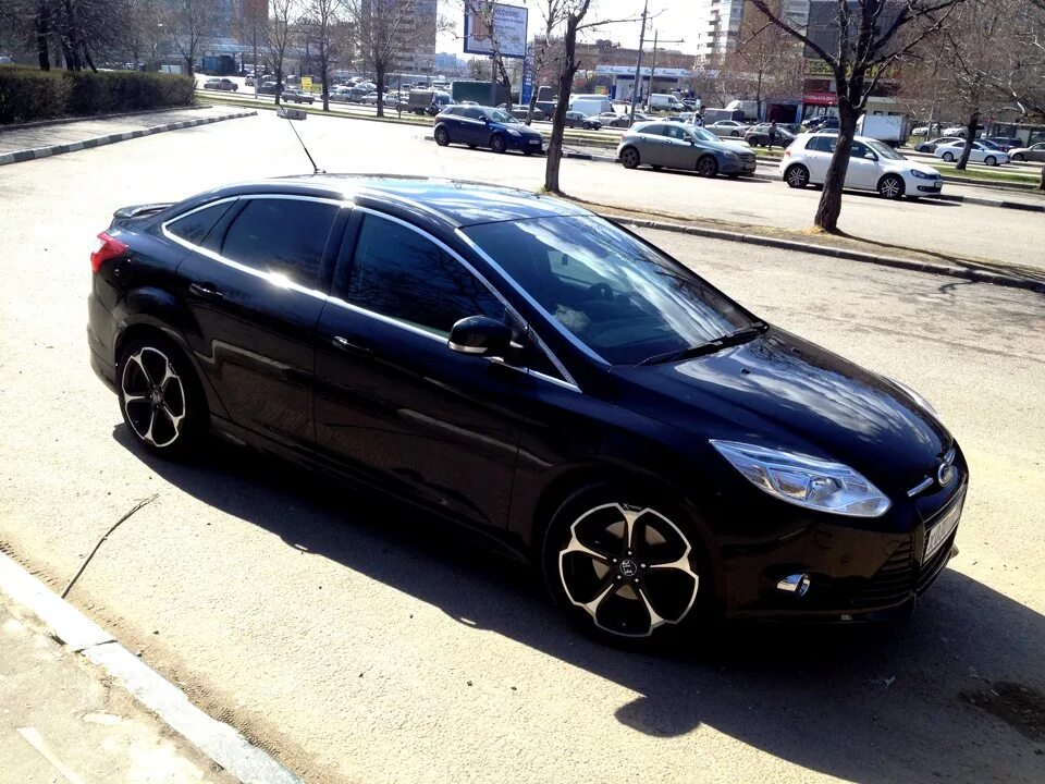 Форд 3 фокус сидан черный. Ford Focus 2012 седан черный. Форд фокус 3 седан 2012 черный. Форд фокус 3 седан чё рный. Хэтчбек черного цвета