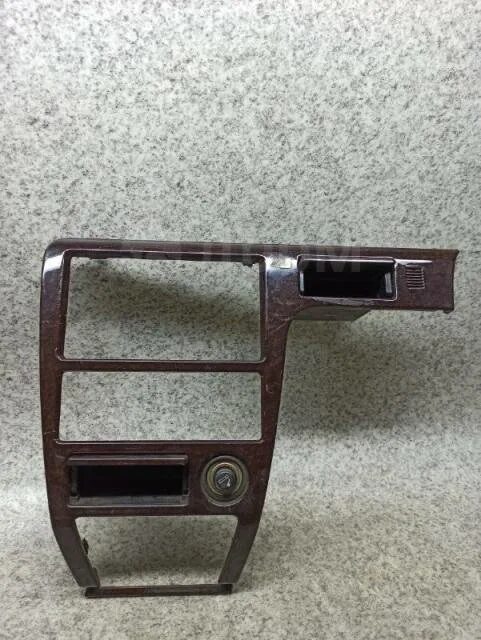 Переходная рамка nissan teana. Консоль магнитофона. Консоль акпп на тойоту старлет. Ниссан седрик cy31 замок в багажник. Пластик салона карбон jzx100.