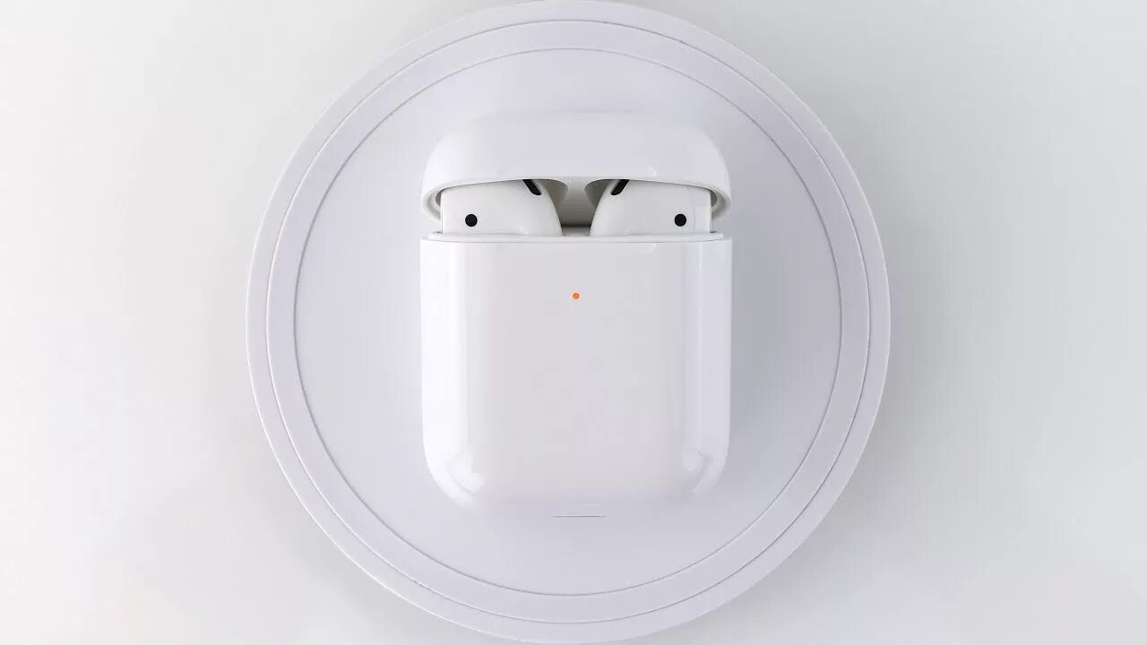 AIRPODS 2 беспроводная зарядка. Айрподс 2 с беспроводной зарядкой. Беспроводные наушники Apple AIRPODS 2 С зарядным футляром mv7n2. Беспроводная зарядка для Apple AIRPODS Pro.