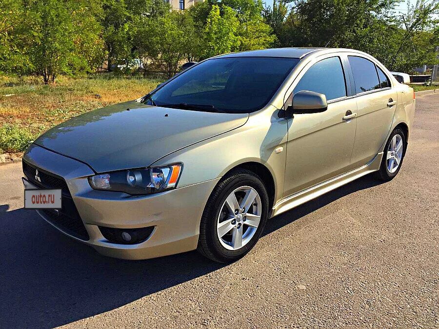 Mitsubishi lancer 10 2008. Митсубиси Лансер 10 золотой. Мицубиси Лансер 2.0. Mitsubishi Lancer 2.0 МТ, 2008. Мицубиси Lancer 2008.