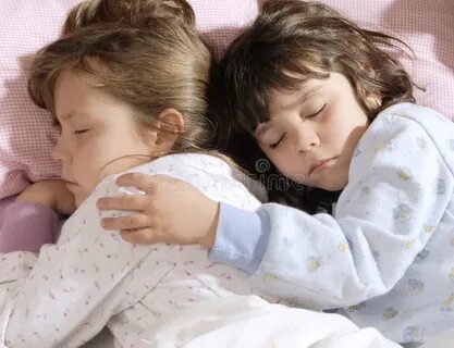 Child sharing bed