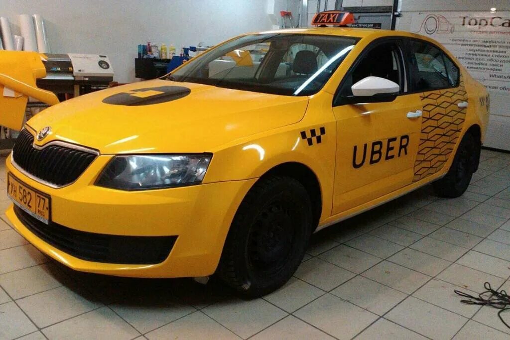 Обклейка машин такси