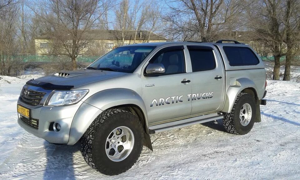 Куплю хайлюкс б у. Тойота Хайлюкс 2. Тойота Хайлюкс АТ 35. Toyota Hilux 2021 Arctic Trucks с кунгом. Тойота Хайлюкс 2013 Арктик Тракс.