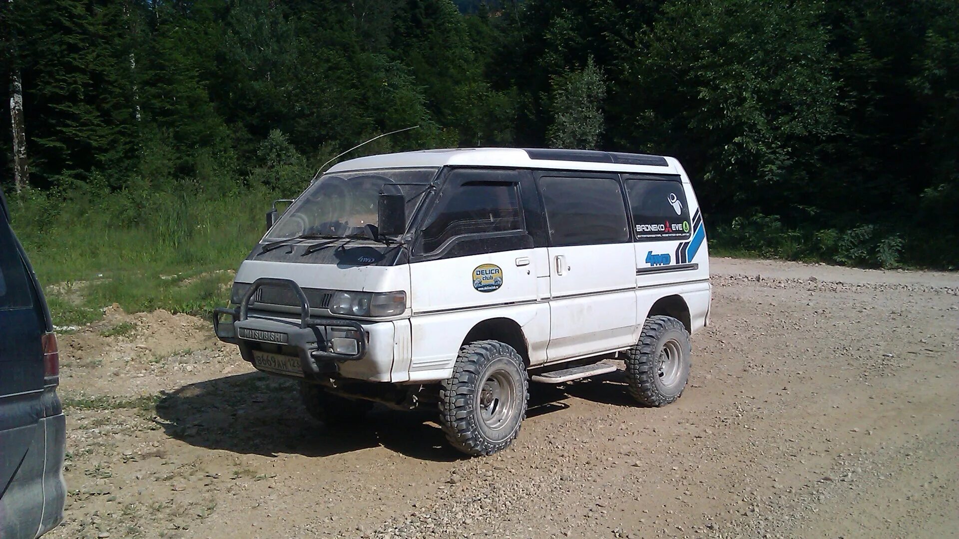 Купить делика хабаровск. Mitsubishi Delica p35. Митсубиси Делика 1993 габариты. Mitsubishi Delica 1993 салон. Mitsubishi Delica p35w салон.