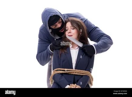 Knifeman threatening tied woman Stock Photo - Alamy