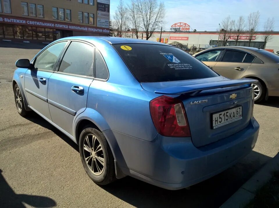 Спойлер шевроле лачетти. Спойлер на Шевроле Лачетти седан. Chevrolet Lacetti спойлер. Лачетти седан 2007 спойлер. Шевроле Лачетти седан красная со спойлером.