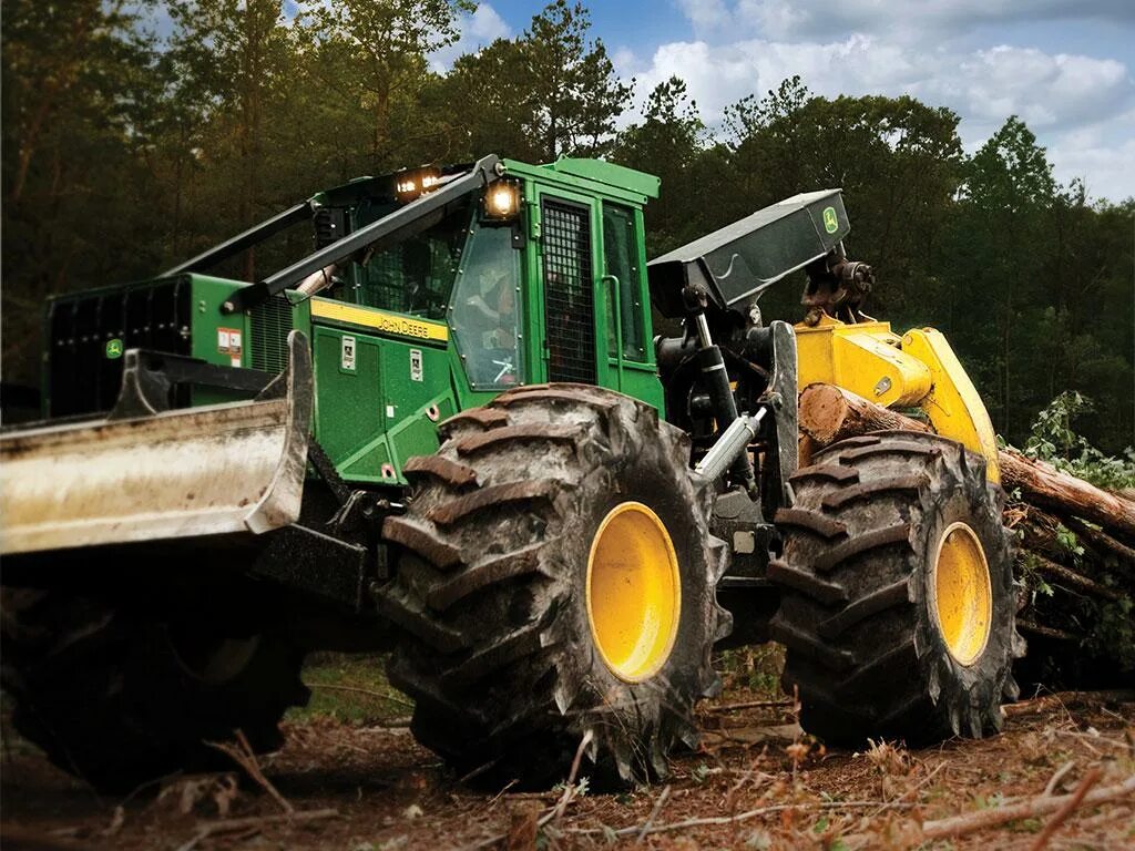 Трелевочный трактор John Deere. John Deere 948l. Скиддер Джон Дир. John Deere 848l.