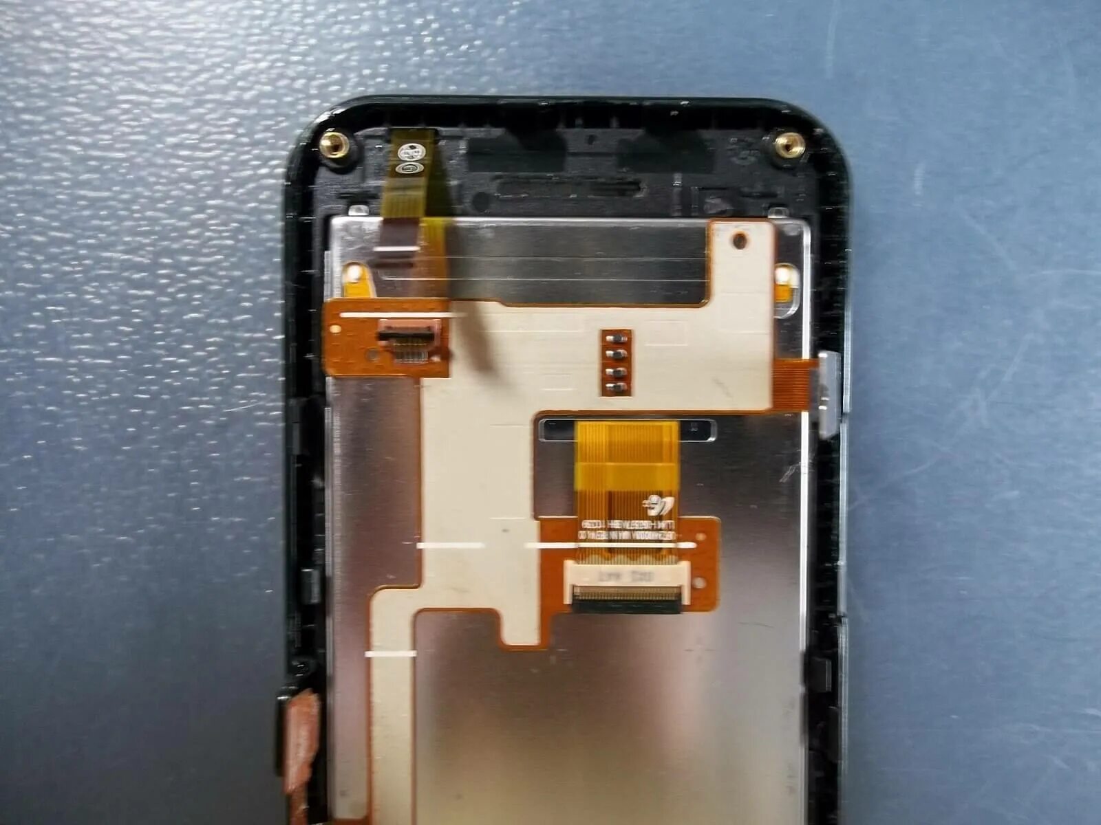 элементы на плате телефона. где находится шлейф. 50 экран шлейф. шлейф на плате телефона. телефон сенсор.