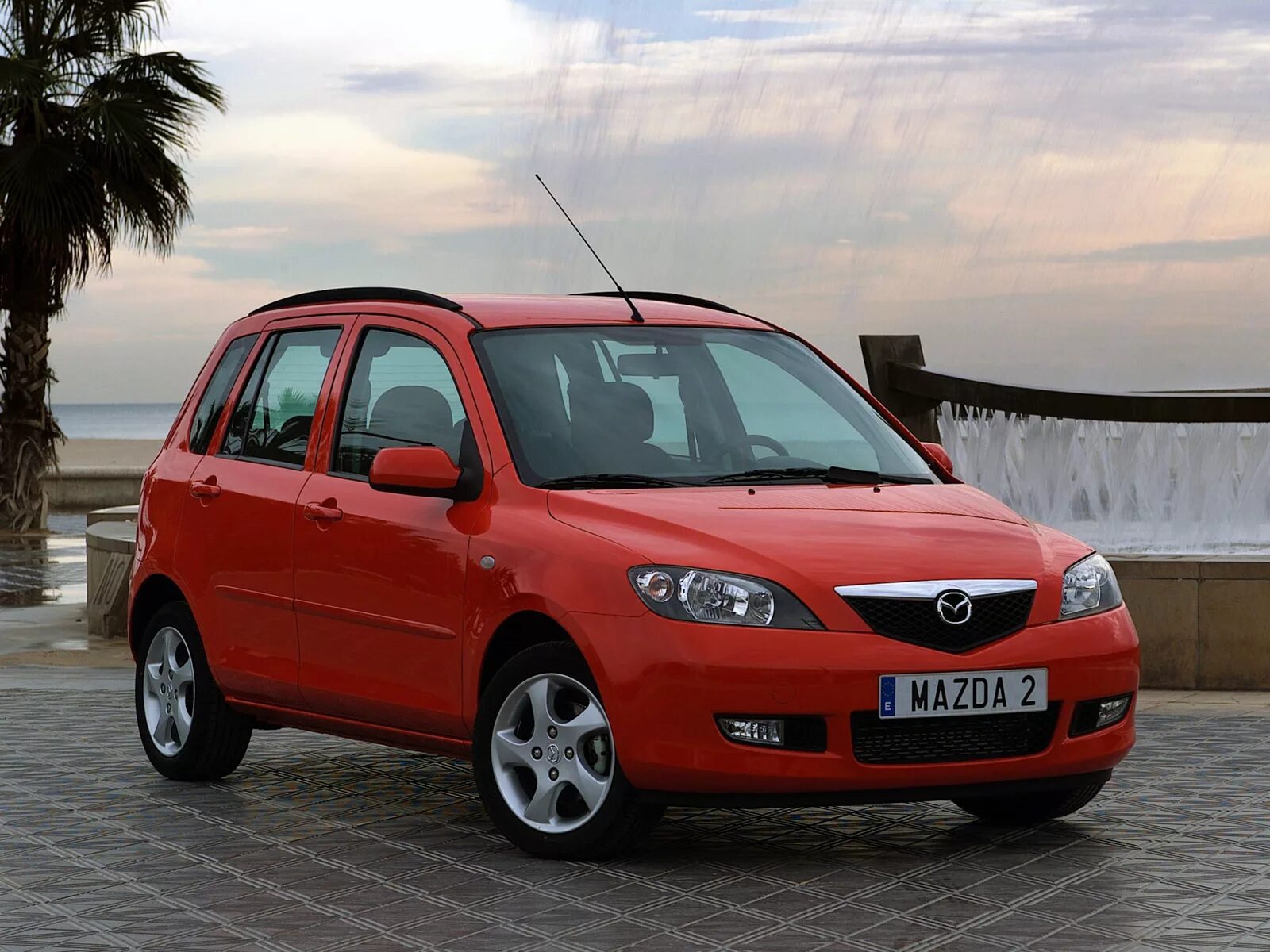 Мазда демио 1 поколение. Mazda Demio/2. Мазда 2 2006 1.4. Mazda 2 2003. Мазда Демио 2 поколение 2003 года.