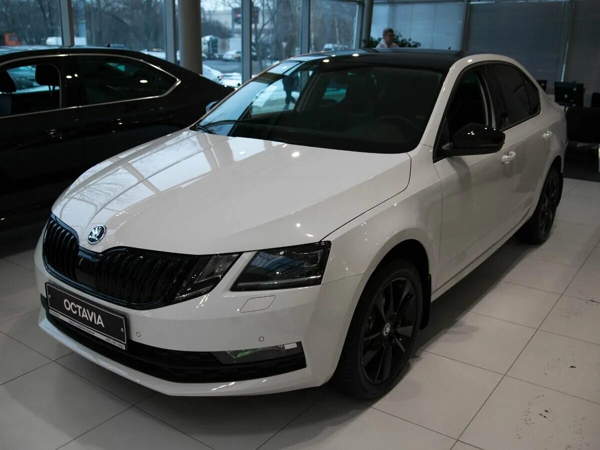 Skoda Octavia, 2018 1.4 TSI DSG (150 Л.С.). Skoda Octavia III 1.4 АМТ (150 Л.С.) чёрный с пробегом на снегу. Купить октавию 2018