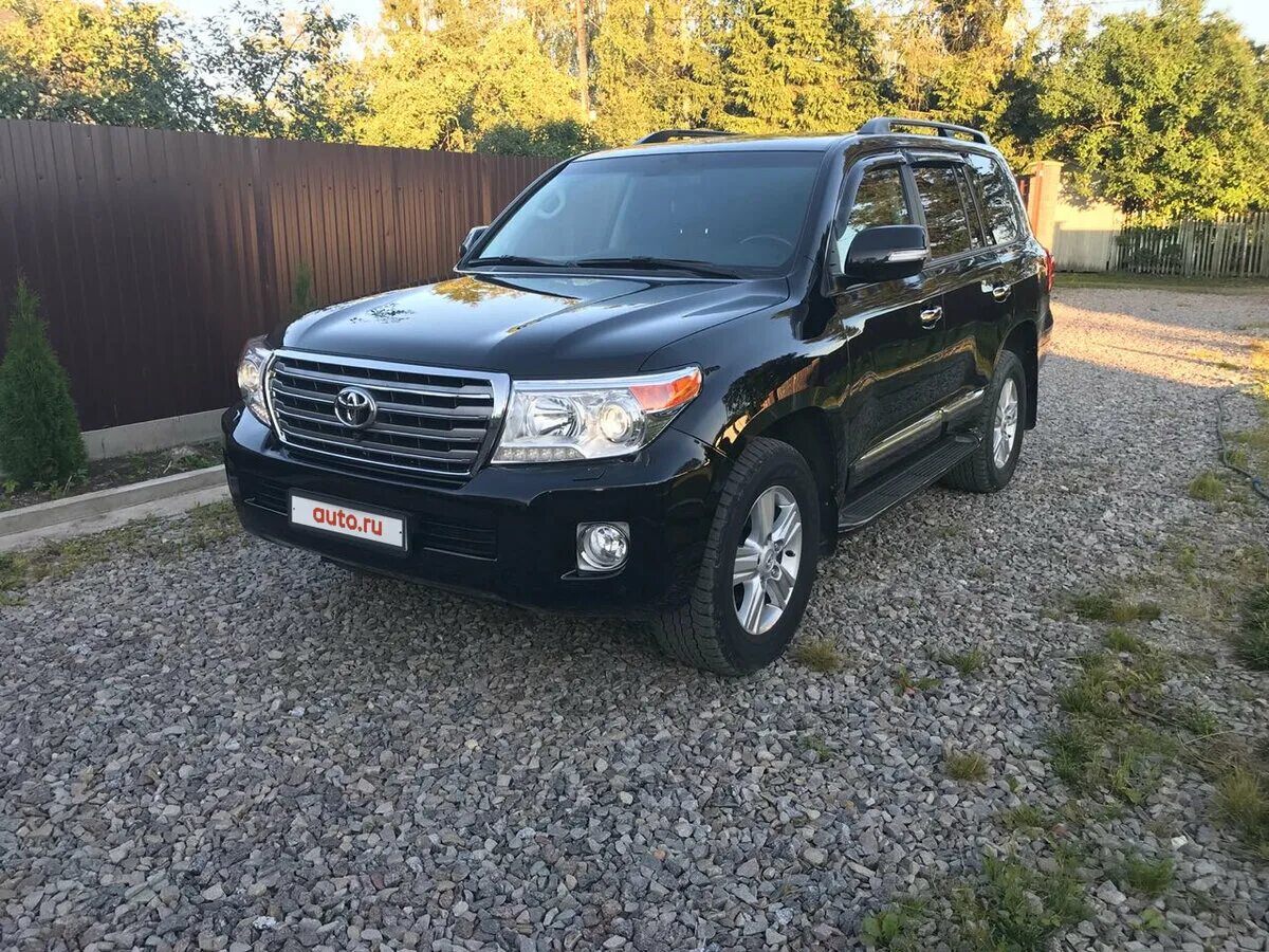 Toyota land cruiser 200 2013 тонированный. Toyota land cruiser 200 рестайлинг 1. тойота 200 черная 2012. тойота ланд крузер 2012 года. Land cruiser 200 2012.