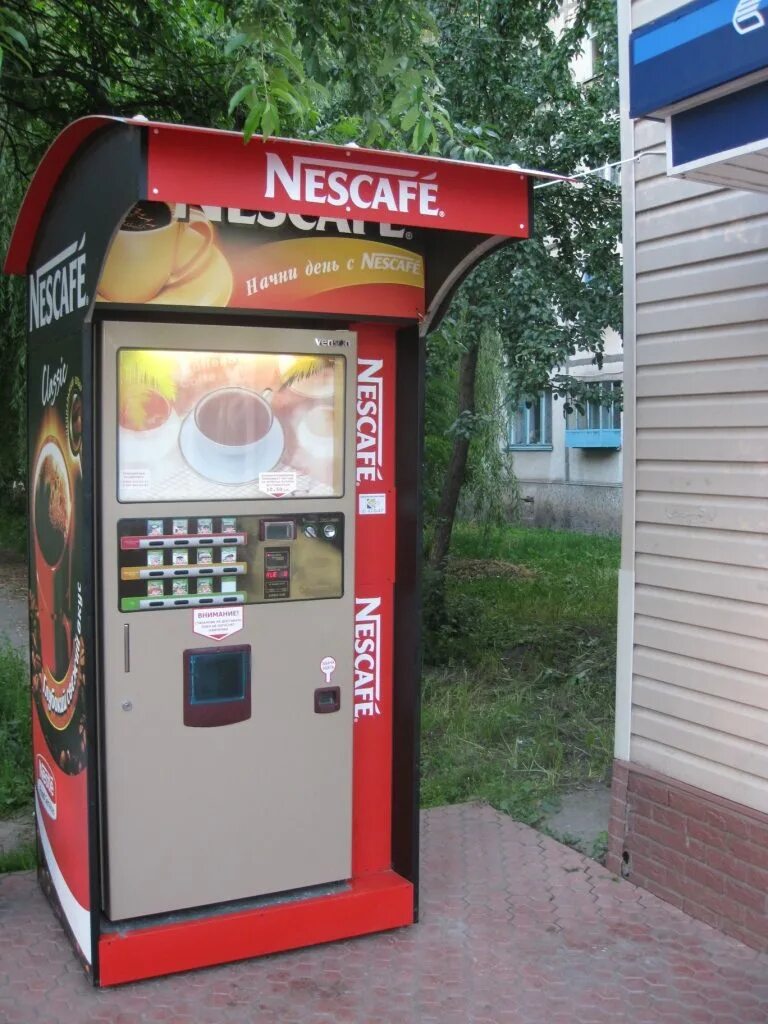 Вендинговый аппарат Нескафе. Вендинговый автомат Nescafe. Вендинговый кофе аппарат Нескафе. Кофейный аппарат самообслуживания Нескафе. Вендинговый аппарат кофе самообслуживания