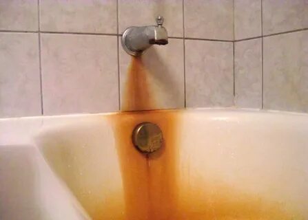 Чем отмыть желтый налет в ванне