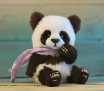 Коричневая панда