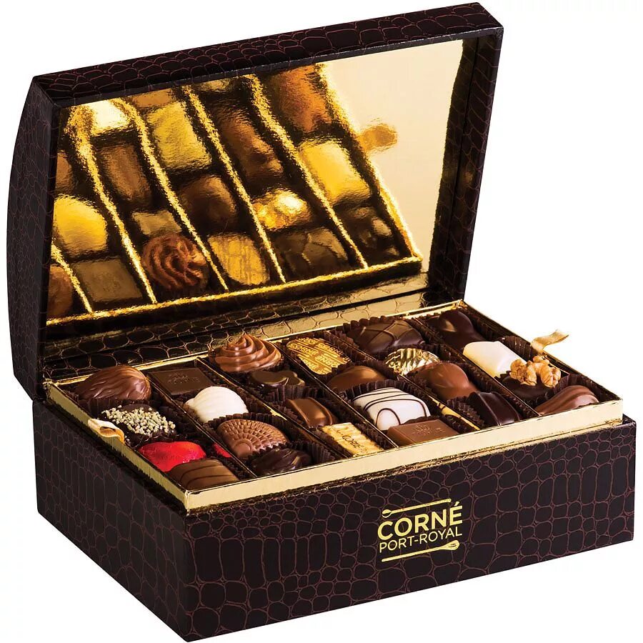 Конфеты в коробках ассортимент. Corne Port Royal конфеты. Конфеты Assorted Chocolates. Конфеты la Madeline au Truffle. Элитные конфеты.