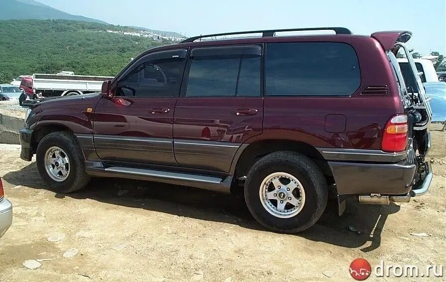 Ленд крузер 100 4.2 дизель расход. Toyota land cruiser 100 бордовый. toyota land cruiser 100 бордовый 100. тойота ленд крузер 100 в японии. лэнд крузер 100 бордовый.
