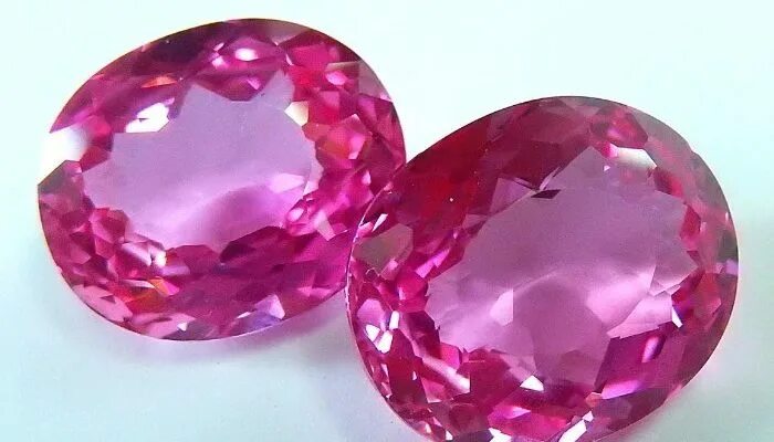 топаз розовый полудрагоценный камень. сапфир камень кварц. берилл морганит камень. розовый камень в ювелирных. турмалин, рубеллит, шпинель.