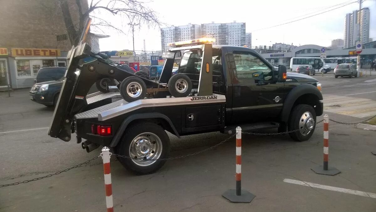 Черный эвакуатор газель некст. Ford f150 эвакуатор. Черный эвакуатор. Черный эвакуатор. Некст фермер эвакуатор.