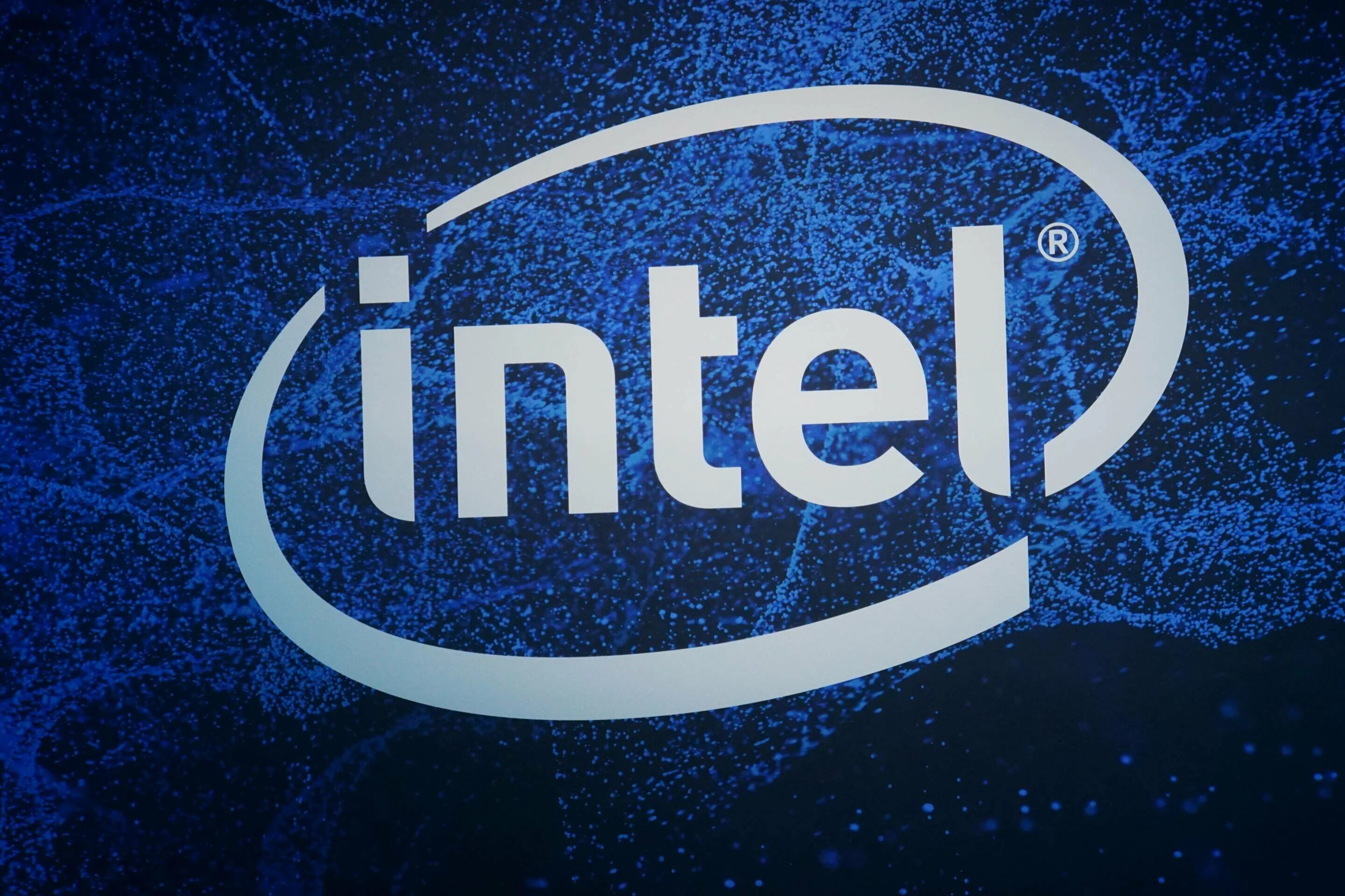 Интел. Эмблема Интел. Корпорация Intel. Компания Intel логотип. Интел логотип