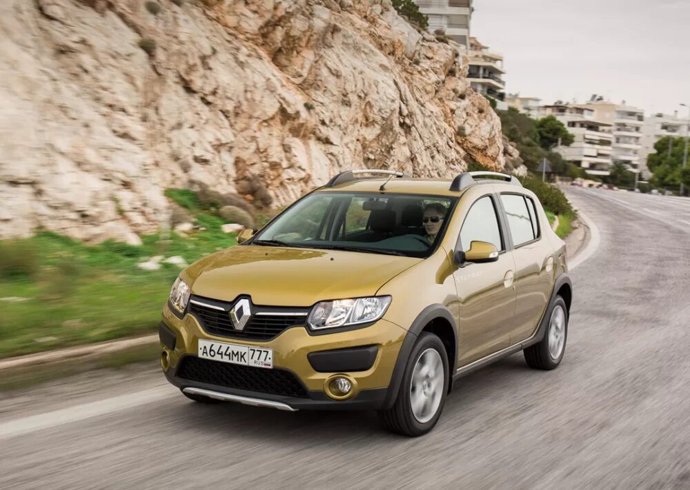 Ренаулт машина. Renault Sandero Stepway. Renault Sandero Stepway 2014. Renault Sandero Stepway 2. Сандеро степвей 2014.