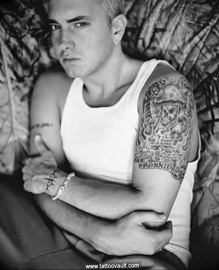 Татуировки эминема. Эминем тату. eminem татуировки. эминем фото тату.