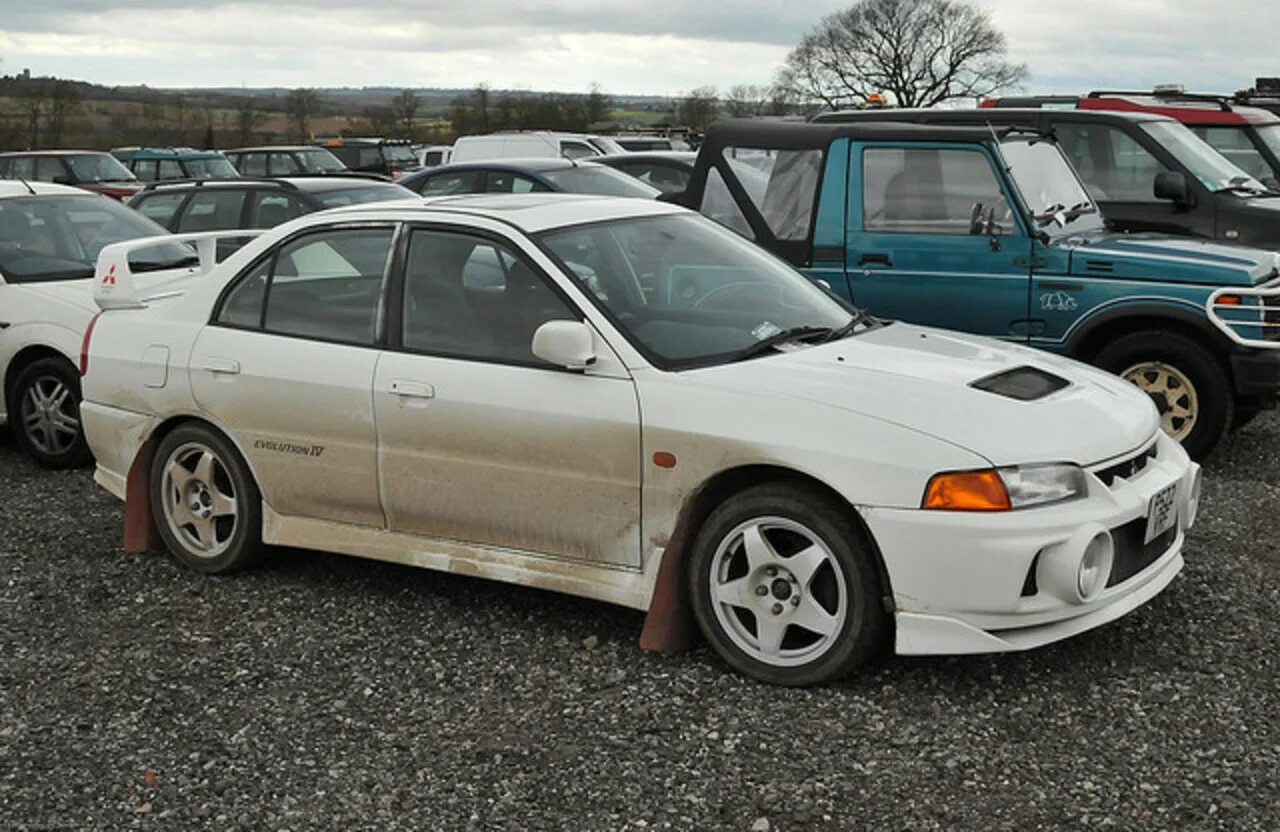 Mitsubishi lancer evolution iv (1996–1998). Evo 4. Evo 4. 4. Mitsubishi lancer gsr.