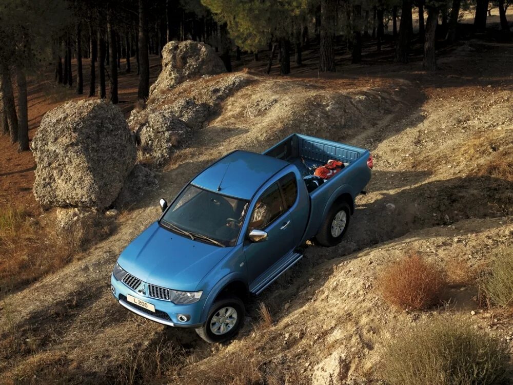 Mitsubishi l200 2011. Мицубиси л200. Mitsubishi l200. Mitsubishi l200 2. Митсубиси л200 IV.