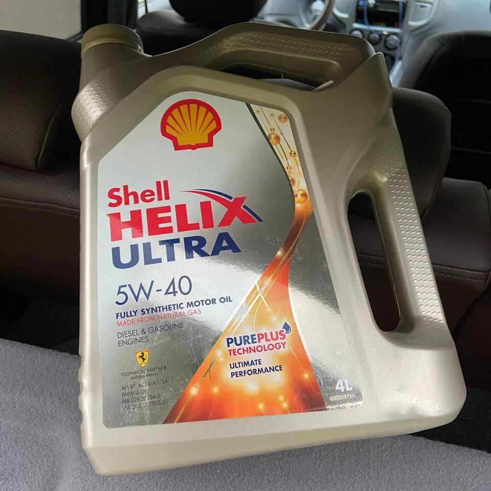 Моторное масло шелл хеликс ультра 5w40 купить. Shell Helix Ultra 5-40. Shell Ultra 5w40. Shell Helix Ultra SP 5w40 4 л. Моторное масло Shell Helix Ultra 5w-40.