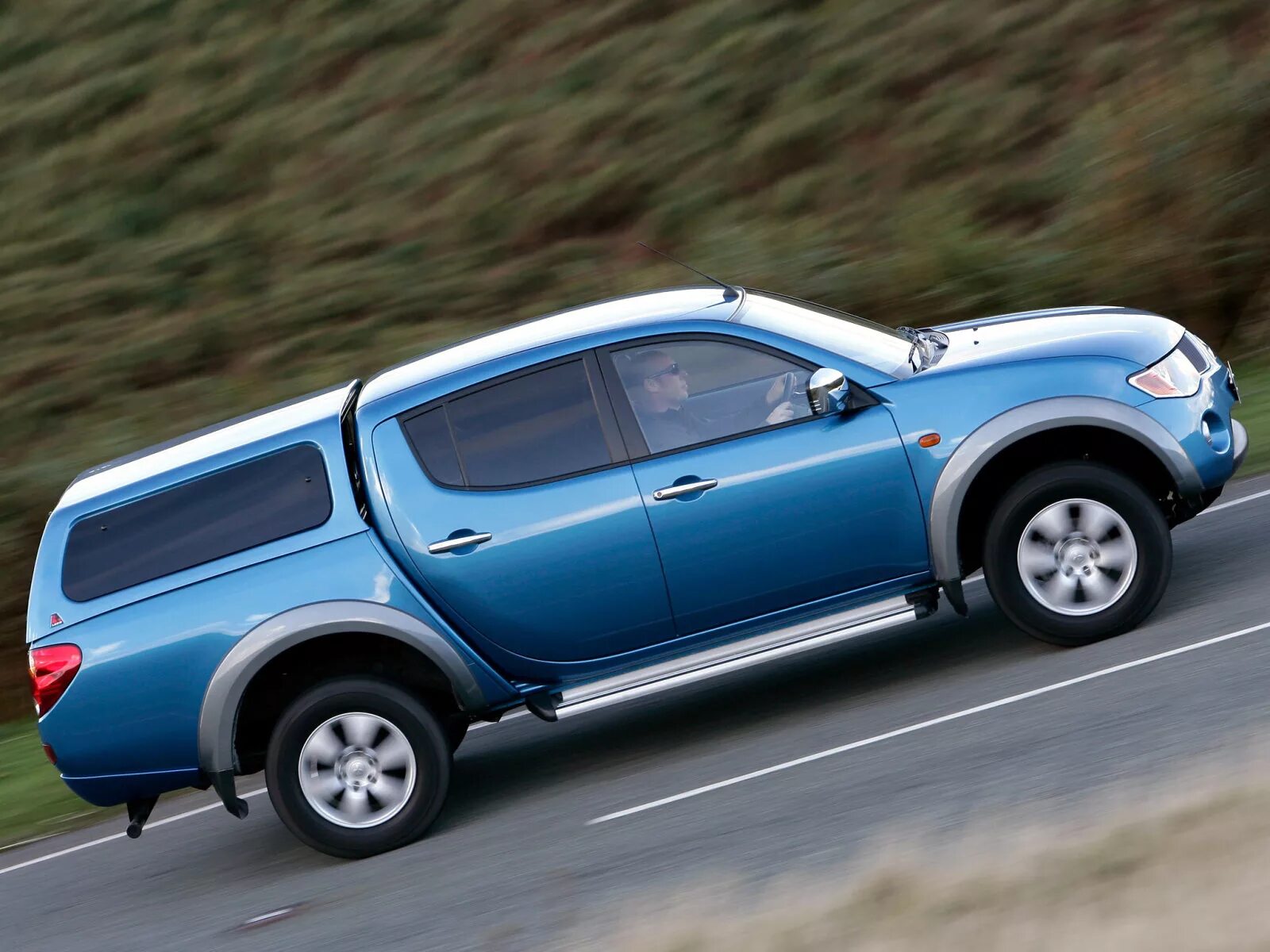 Митсубиси спорт кузов. Мицубиси l200. Митсубиси л200. L 200 Mitsubishi l200. Mitsubishi l200 IV.