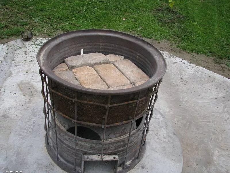 Тандыр из дисков автомобиля. Тандыр из дисков автомобиля. Печь для казана из колесных дисков. Подставка под казан из диска зил 131. Печь из дисков.