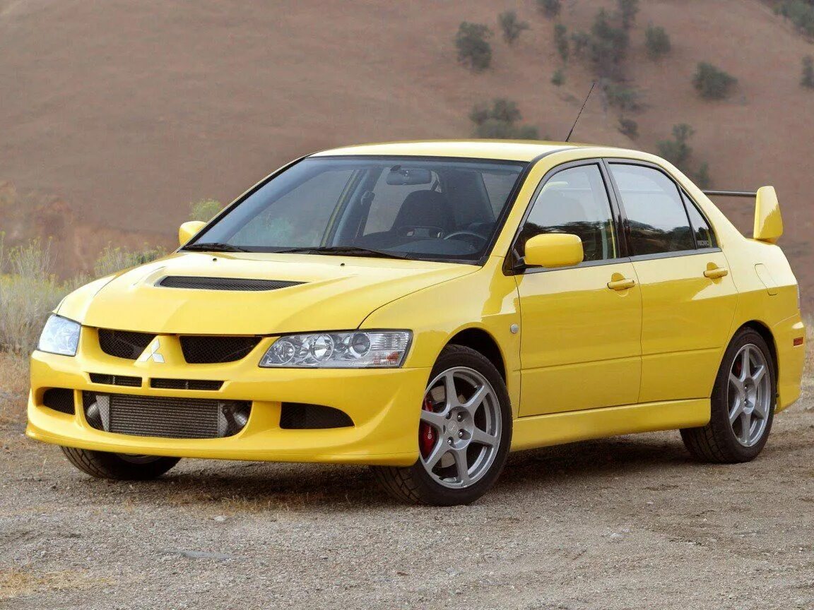 Evo tl. Митсубиси Лансер 8. Mitsubishi EVO 8. Митсубиси Лансер Эволюшн. Митсубиси Лансер 8 Эволюшен.