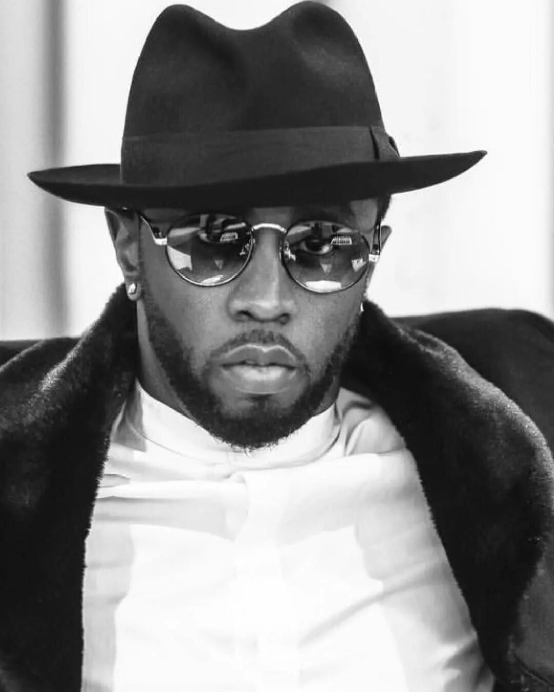 Puff daddy рэпер. Пафф дэдди в молодости. История с diddy. Шон комбс. P diddy.