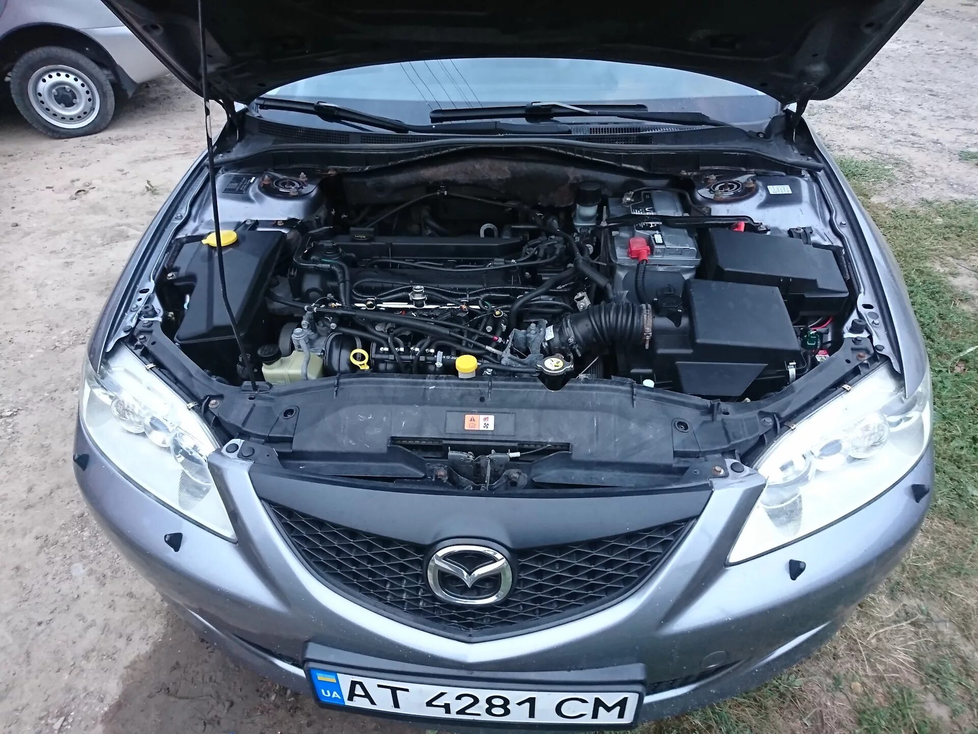 Капот мазда 6 gg. Мазда 6 2008 под капотом. Mazda 6 под капотом. Мазда 6 2007 под капотом. Mazda 6 gg под капотом.