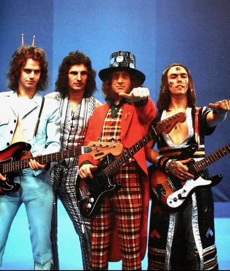 Зарубежная группа 60. Группа Slade. Slade группа глэм рок. Группа Slade в 70х. Slade состав группы.