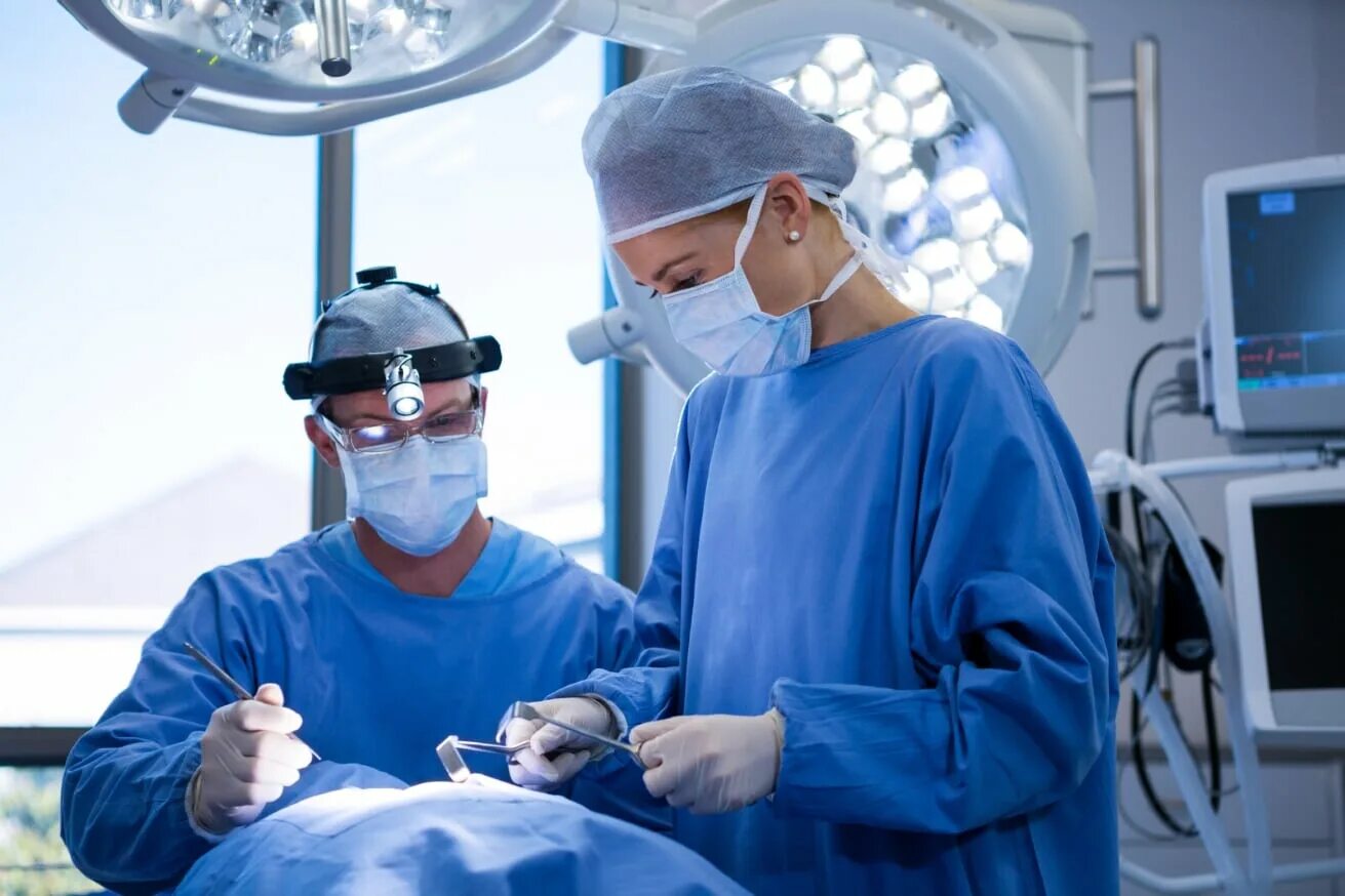 Surgeons performs operations