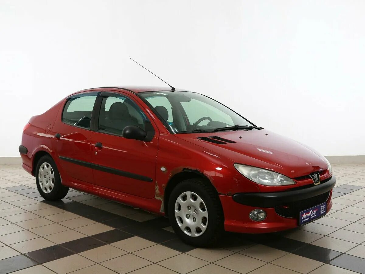 4. 4. 4 75 л. Пежо 206 седан красный. 4 2007.