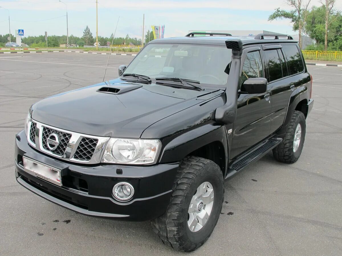 Патрол y61 рестайлинг. Ниссан патрол 2008. ниссан патруль 2008. nissan patrol y61 черный. ниссан патрол 61.