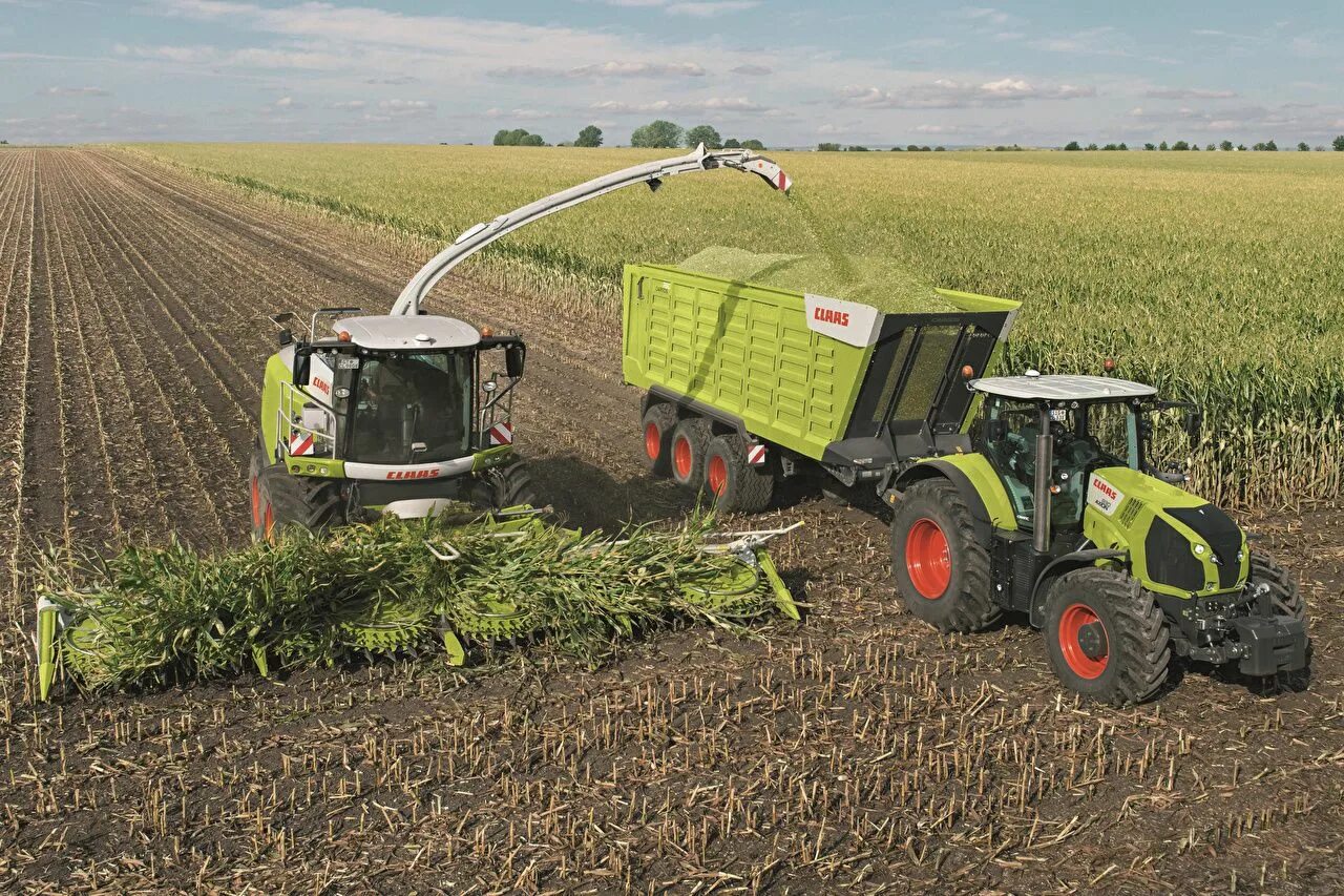 Комбайн машина трактор. CLAAS Axion 980. Трактор CLAAS 6[3. Сельхозтехника для фермерских хозяйств. Транспорт в сельском хозяйстве.