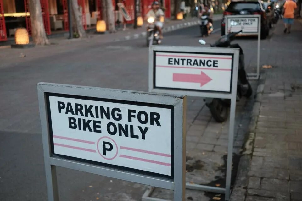 Honda parking only. Suzuki parking only. Bridge only for Bikes. Park only for which.