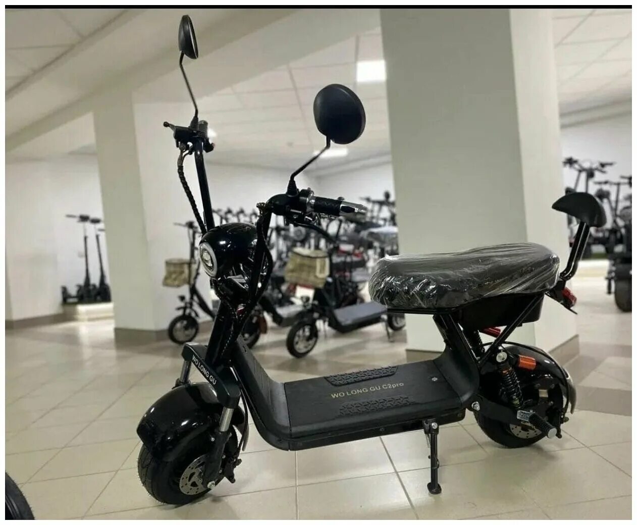 Wolong gu. Электроскутер wolong. электросамокат wolong c1 pro. электросамокат волонг с2 про. wolong c2 pro.