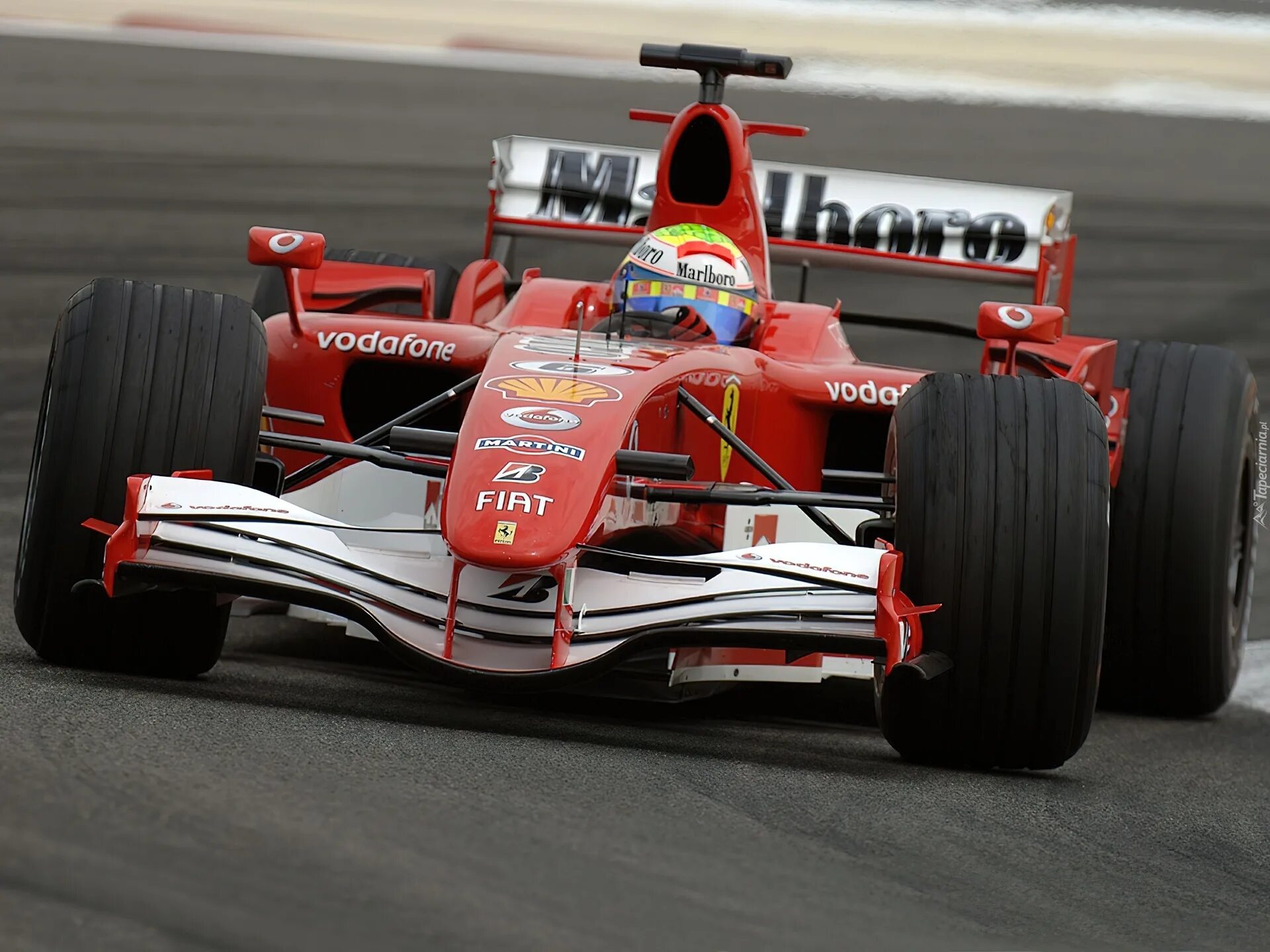 Феррари гоночная машина формула 1. Болид ф1 феррари 2022. Макларен f1 old. F 1. Болид ф1 феррари.