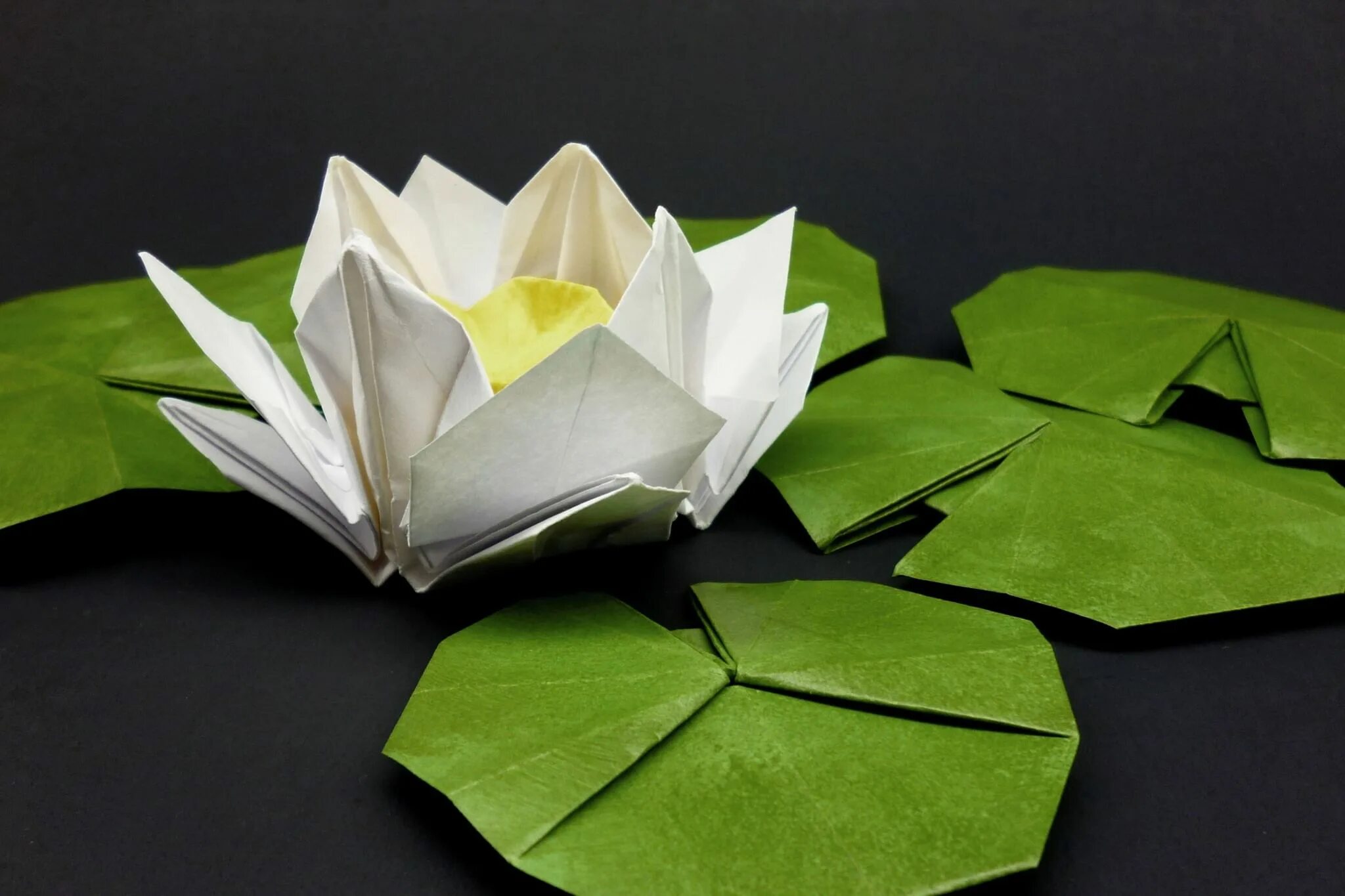 Складывание из бумаги. Оригами кувшинка (Лотос). Оригами Лилия кувшинка. Оригами цветок кувшинка. Оригами Лотус.