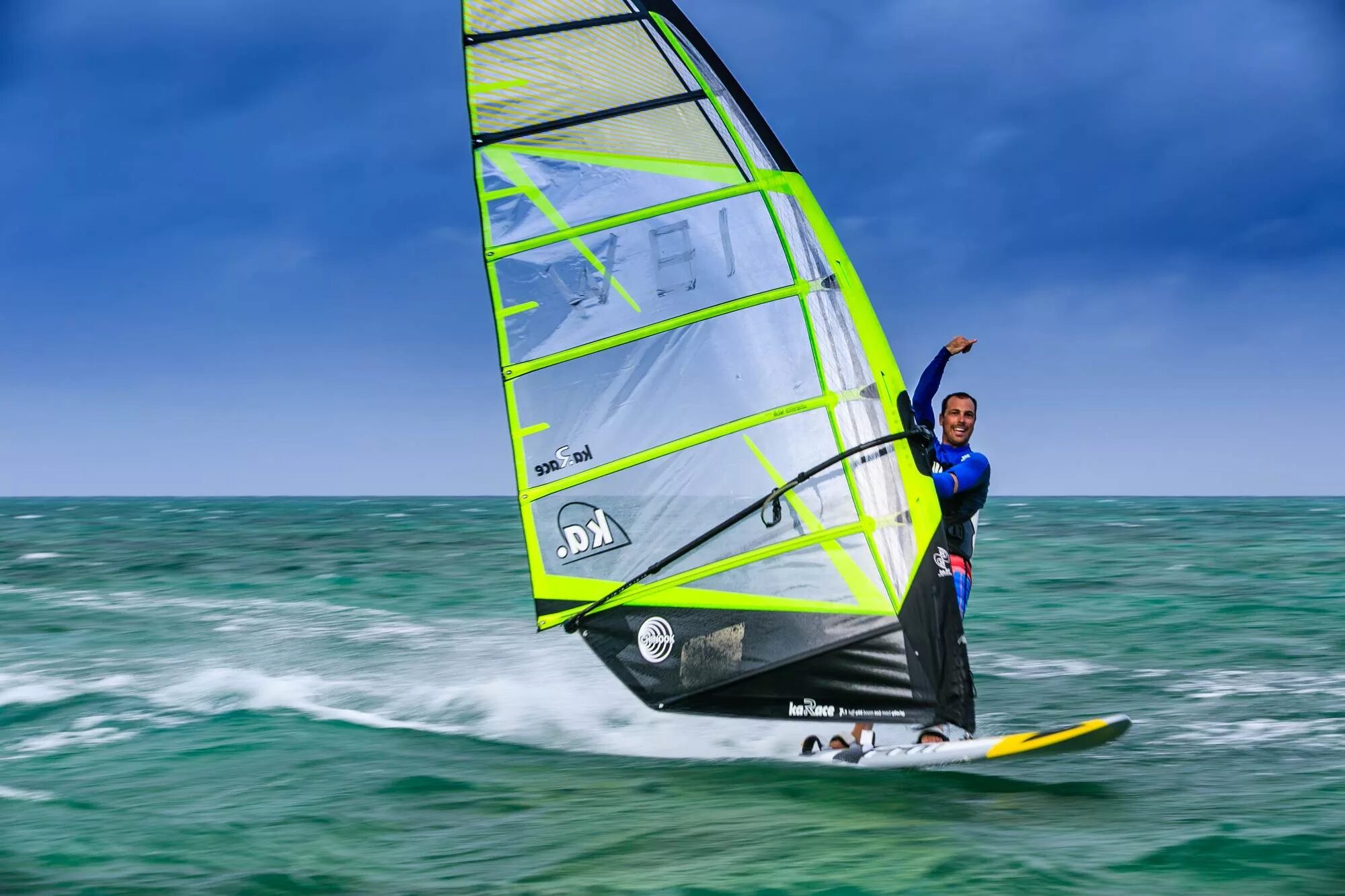 Go wind surfing. Виндсерфинг на гавайях. Водные виды спорта. Девушка на виндсерфе. Go wind surfing.