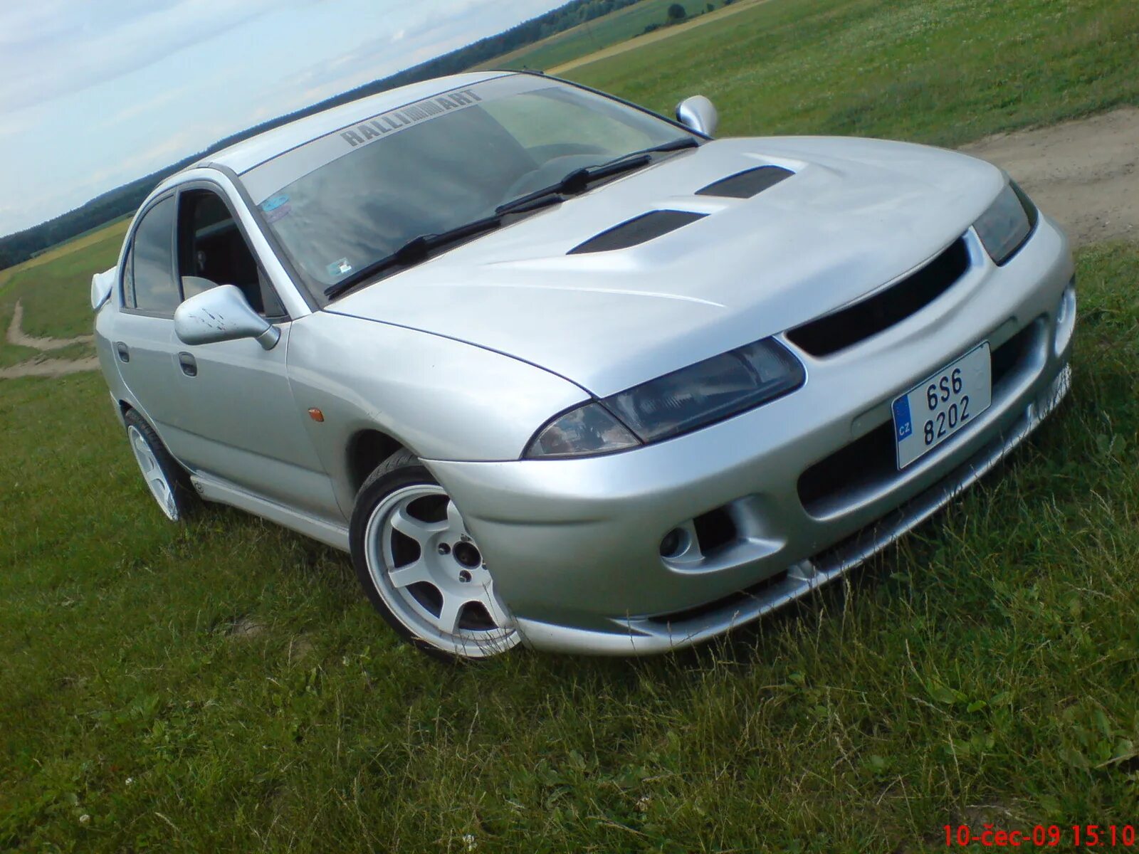 Mitsubishi Carisma 1998 обвесы. Mitsubishi Carisma Tuning 2002. Митсубиси Каризма 1998. Mitsubishi Carisma 1996 Tuning. Купить на каризму 1.6