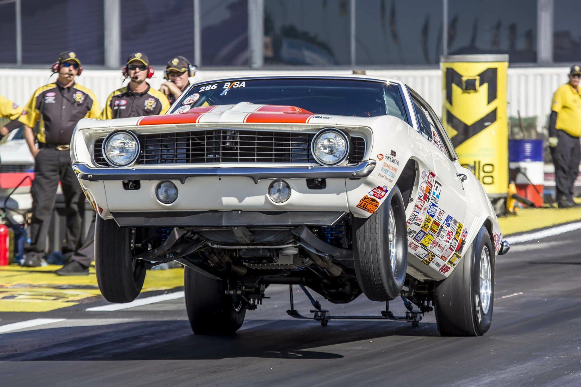 Драг рейсинг где. Драгстер Форд. Lamborghini Dragster. Автоспорт драг рейсинг. Машины драг рейсер.