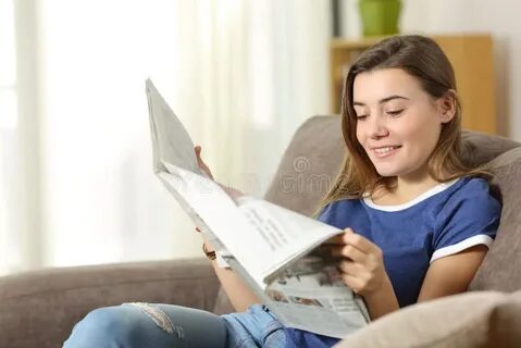 He is reading a newspaper now