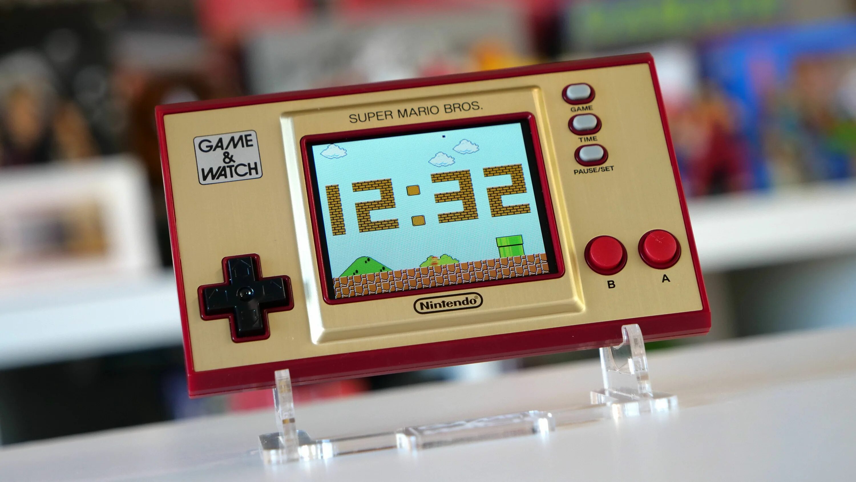 Нинтендо game and watch. Гейм вотч Марио. Игровая приставка Nintendo super Mario Bros.. Нинтендо гейм вотч Марио. Игра новые часы