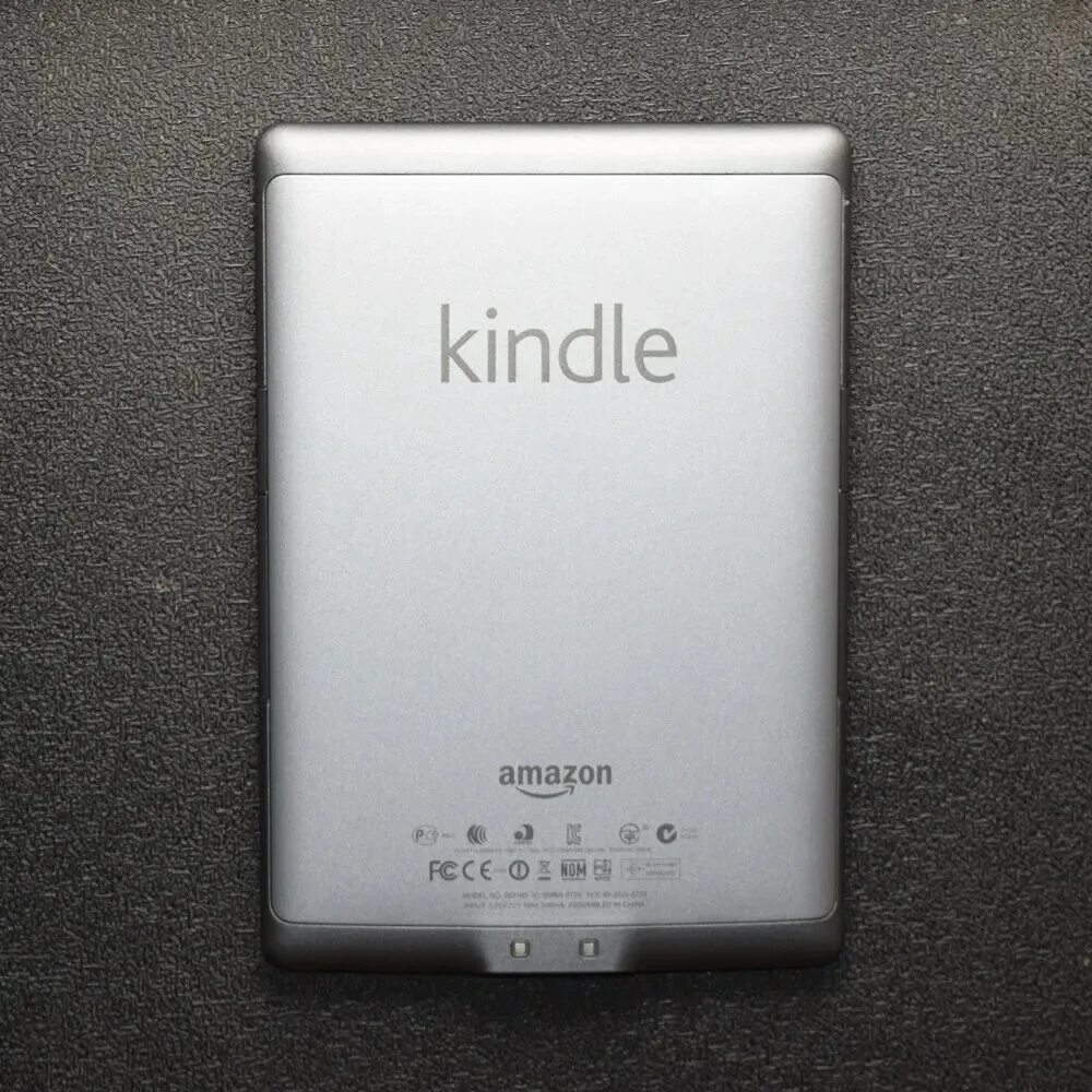 Книга kindle 4. Amazon kindle первая версия. Киндл книга. Kindle 5 электронная книга. Электронная книга amazon kindle.